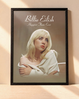 Poster Billie Eilish – Happier Than Ever encadré dans un cadre noir, posé contre un mur clair
