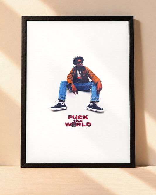 Poster Brent Faiyaz – Fuck The World encadré dans un cadre noir, posé contre un mur clair