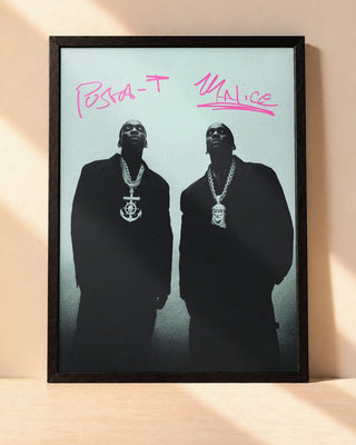 Poster Clipse – Let God Sort Em Out encadré dans un cadre noir, posé contre un mur clair