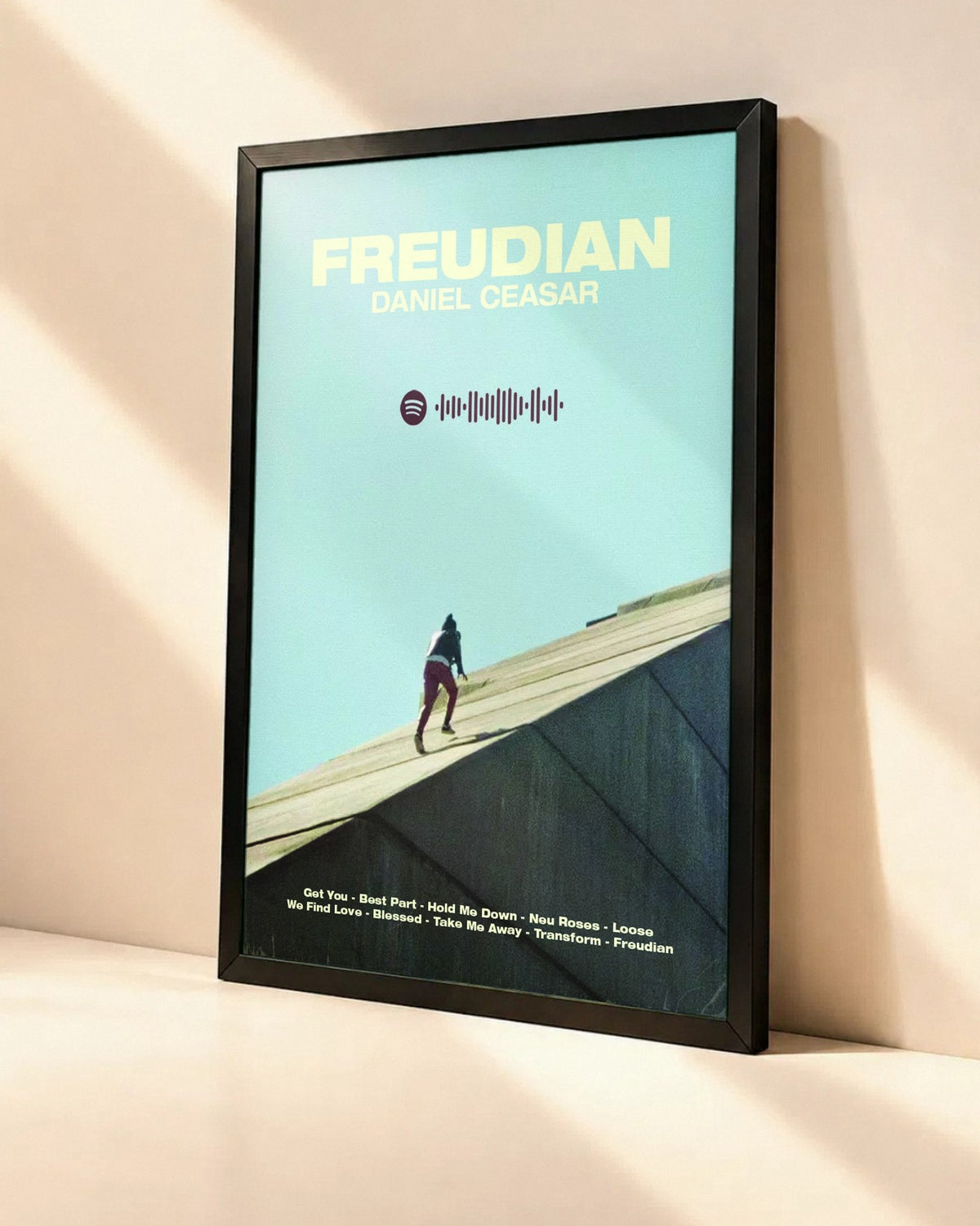 Poster Daniel Caesar – Freudian dans un cadre noir, vue en angle