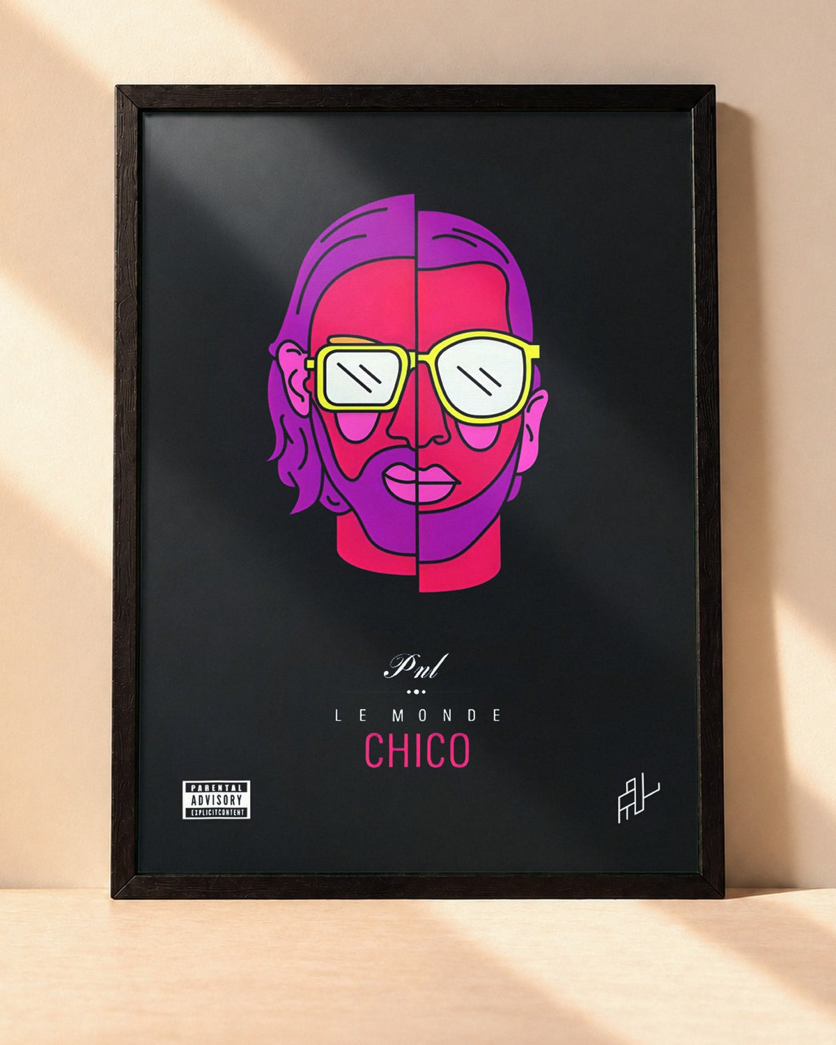 Poster PNL – Le Monde Chico encadré dans un cadre noir, posé contre un mur clair