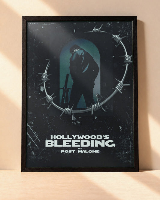 Poster Post Malone – Hollywood's Bleeding encadré dans un cadre noir, posé contre un mur clair