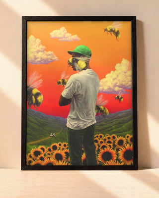 Poster Tyler, The Creator – Flower Boy encadré dans un cadre noir, posé contre un mur clair