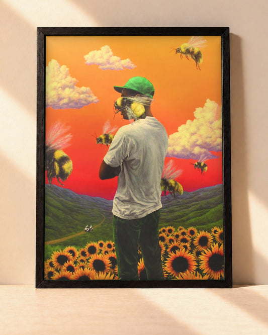 Poster Tyler, The Creator – Flower Boy encadré dans un cadre noir, posé contre un mur clair