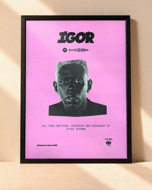 Poster Tyler, The Creator – IGOR encadré dans un cadre noir, posé contre un mur clair